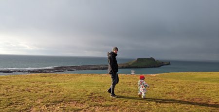 Walk at Rhossili overlooking the sea and wormshead